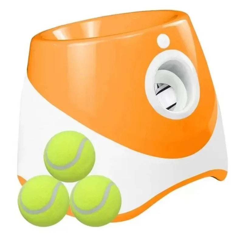 Orange and white tennis ball launcher with three green tennis balls on a white background