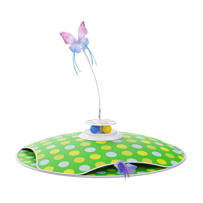 Cat toy with green polka dot base, colorful butterfly, and small balls on a white background