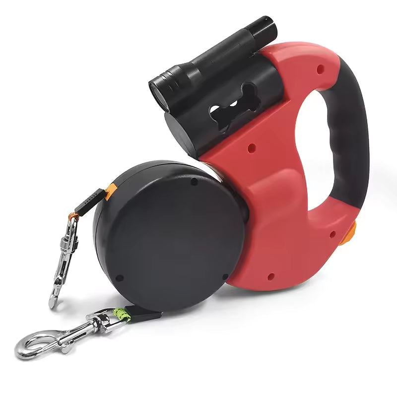Red and black retractable dog leash with flashlight on a white background