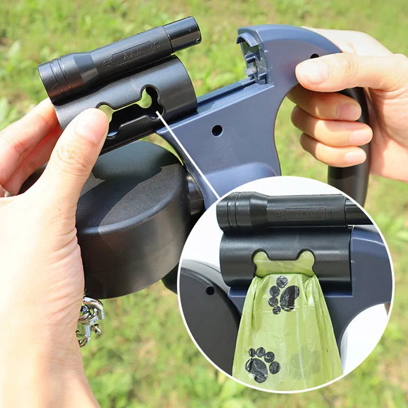 Dog waste bag dispenser being used with a close-up of the bag holder.